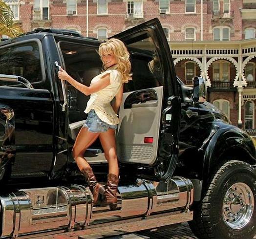 Sexy girl in front of outrageous F650