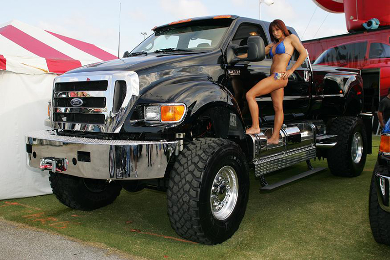Unbelievable hot girl in front of Ford monster truck