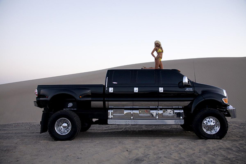Unbelievable hot girl in front of Ford monster truck
