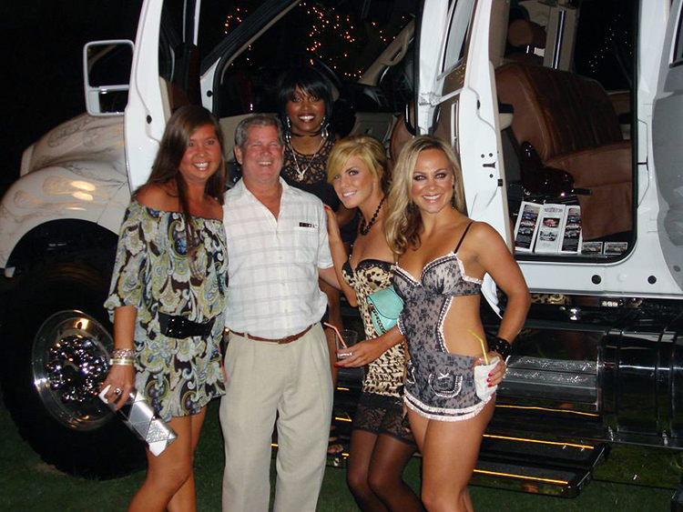 Owner Chris with wife and Playboy bunnies